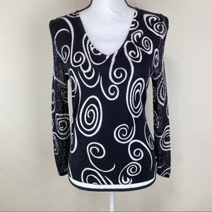 Nygard Collection V neckline pullover top.